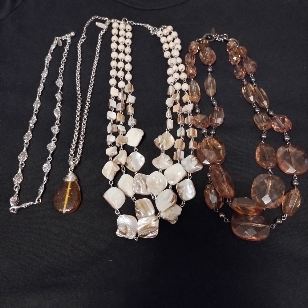 Set of 4 NY&CO signed necklaces